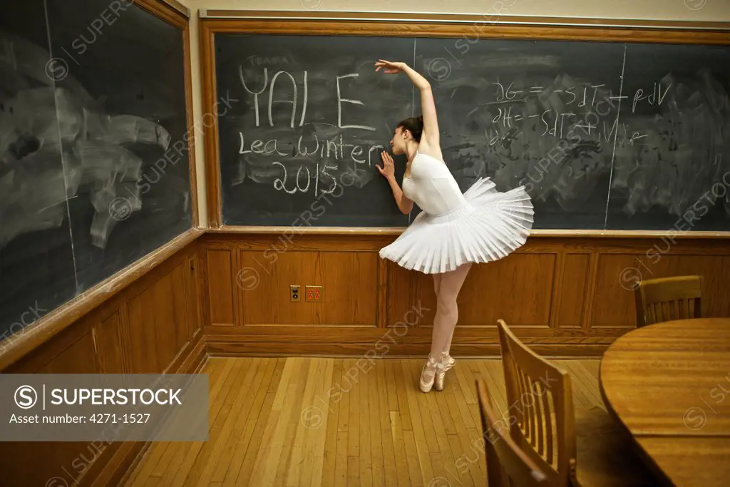 USA, Yale University, Classic ballerina dancing inside classroom