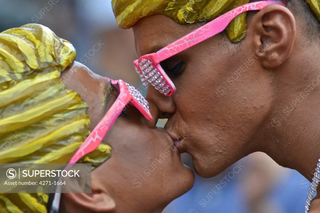 Ken and Ken. USA, New York State, New York City, Jackson Heights neighborhood, Homosexual couple kissing during 2013 Queens Pride