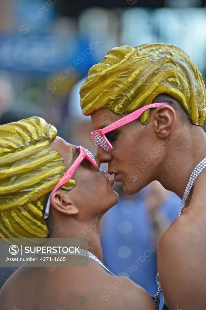 Ken and Ken. USA, New York State, New York City, Jackson Heights neighborhood, Homosexual couple kissing during 2013 Queens Pride