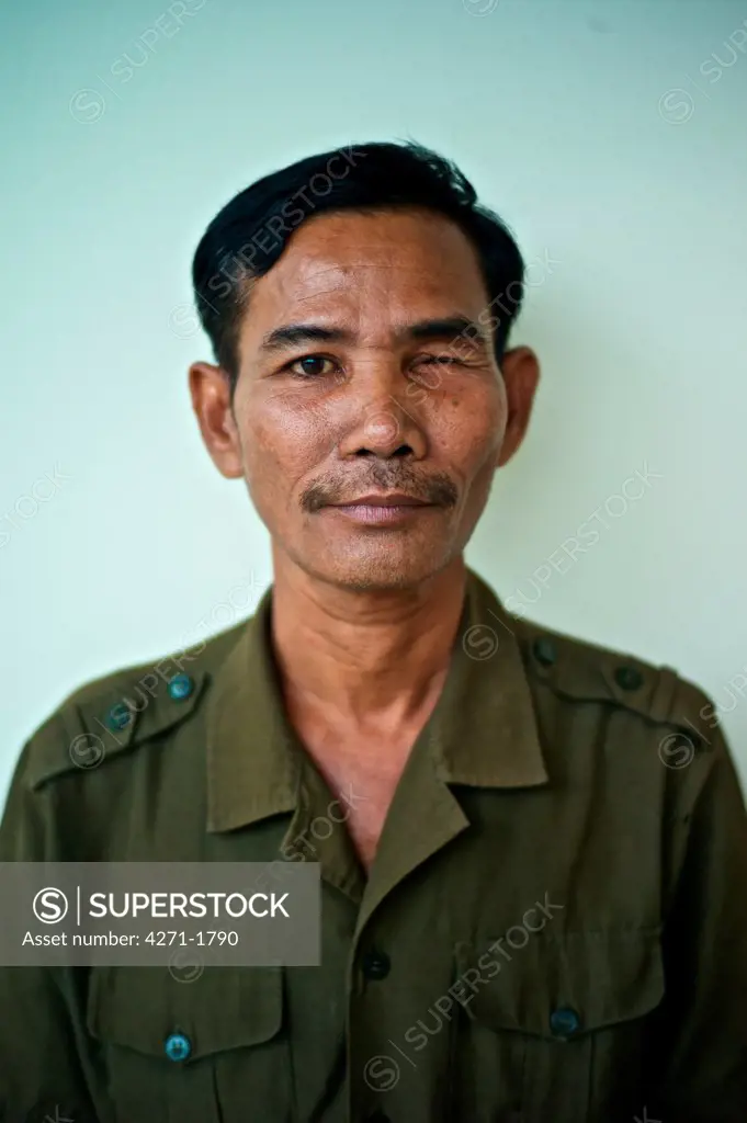 Portrait of a Cambodian land mine survivor, Luang Phabang, Laos
