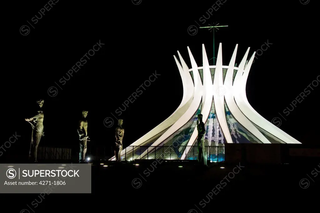 Metropolitan Cathedral of Our Lady Aparecida with the statues of the four evangelists at night, Brasilia, Brazil