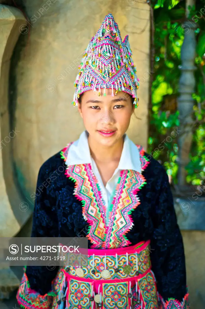 Teen girl wearing a Hmong Kao Traditional Dress.  Girl: Zao Yang