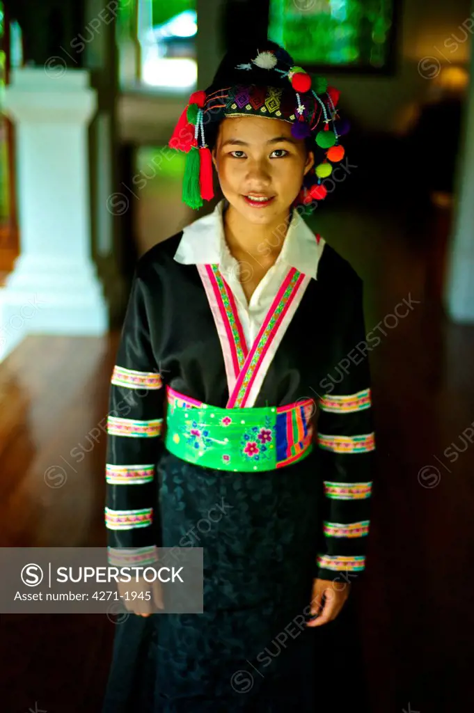 Teen girl wearing a Hmong Lai Traditional Dress. Girl: Zao Yang