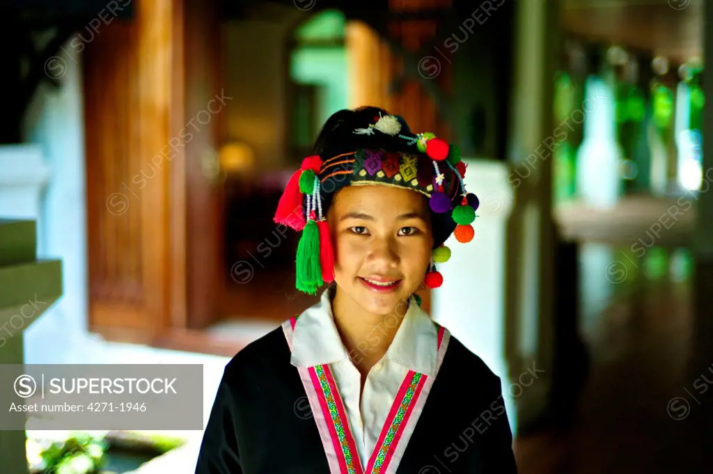 Teen girl wearing a Hmong Lai Traditional Dress. Girl: Zao Yang