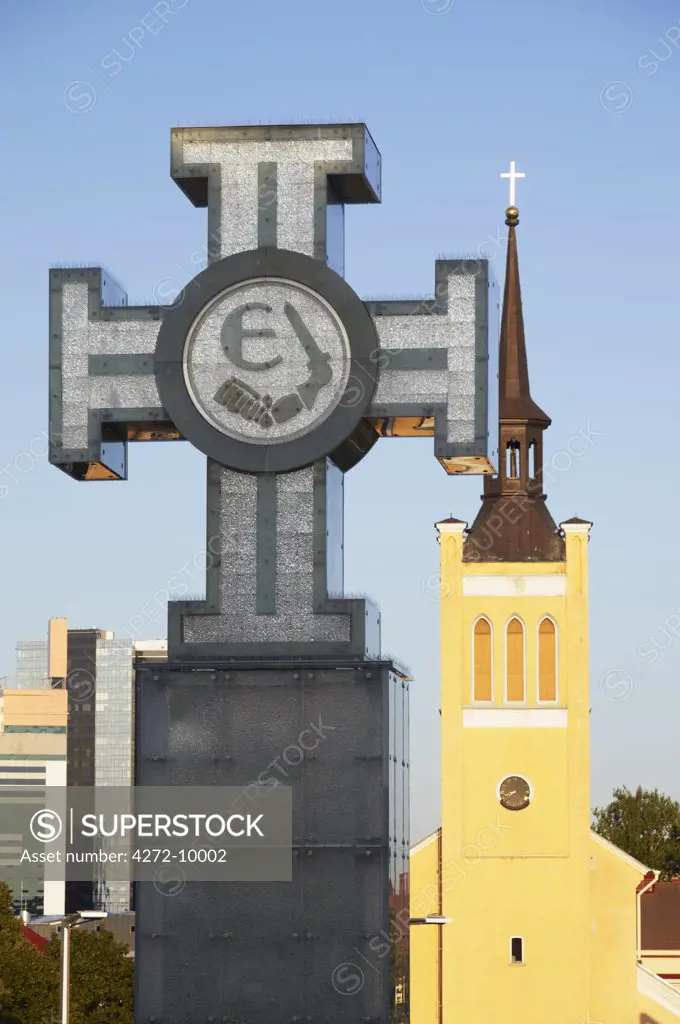 Estonia, Tallinn, Cross In Freedom Square With St John's Church (Jaani Kirik) In Background
