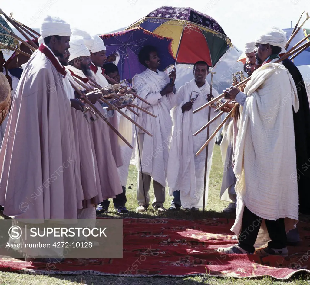 Ethiopian Orthodox priests perform the Dance of the Priests to celebrate Timkat, the churchs most important Holy Day.  Ethiopia is Africa's oldest Christian nation where more than half the population follows the Ethiopian Orthodox faith.
