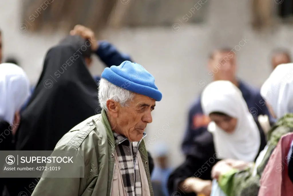 Algeria, Algiers. Man in the market.