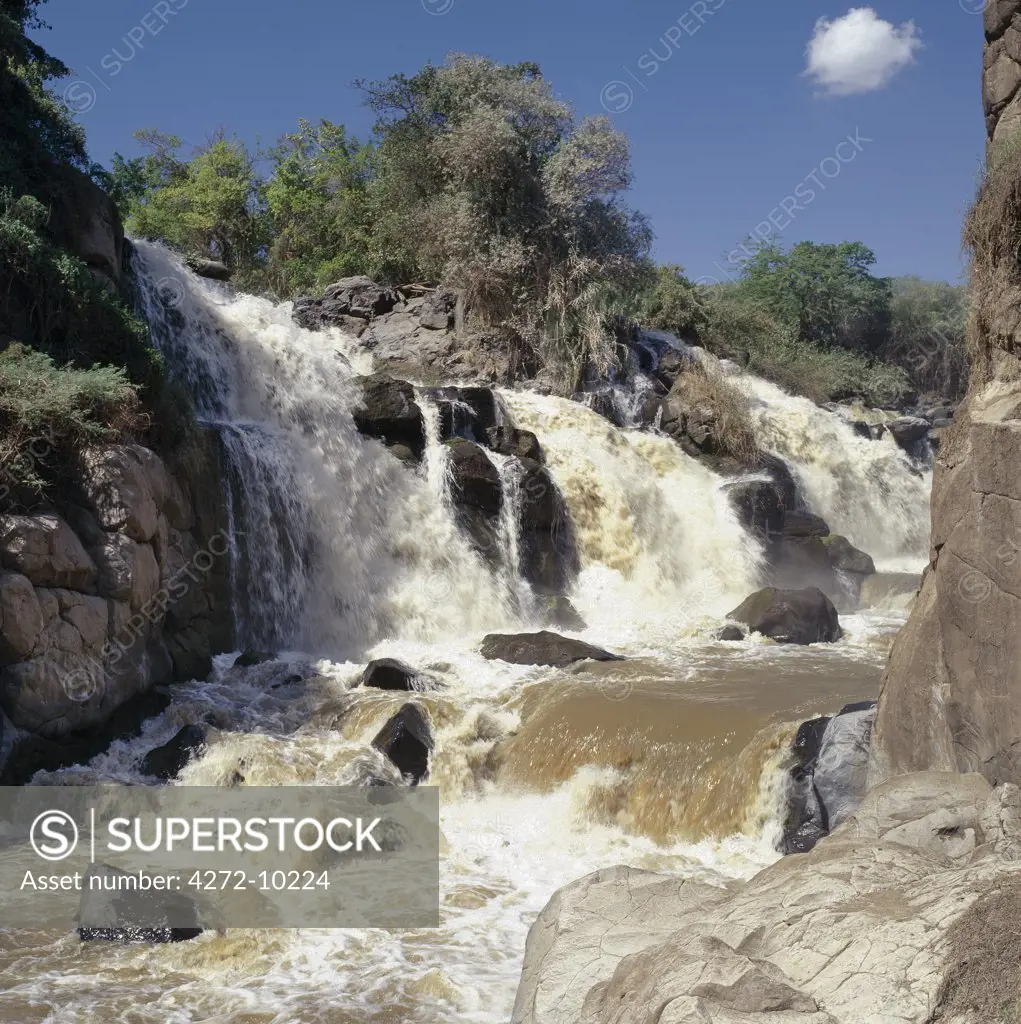 The dramatic Awash Falls are situated in the Awash National Park.  The huge volume of water from one of Ethiopias largest rivers drops over a series of falls as it enters a large gorge.