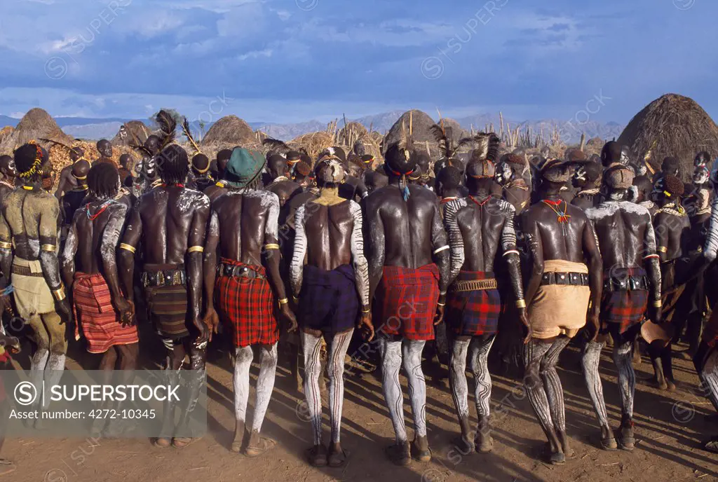 Karo men dance by jumping up in the air holding hands.  Each age group of warriors come forward in turn and dance together, advancing as they dance higher and higher until they finish with a last high leap.  A small Omotic tribe related to the Hamar, the Karo live along the banks of the Omo River in southwestern Ethiopia.