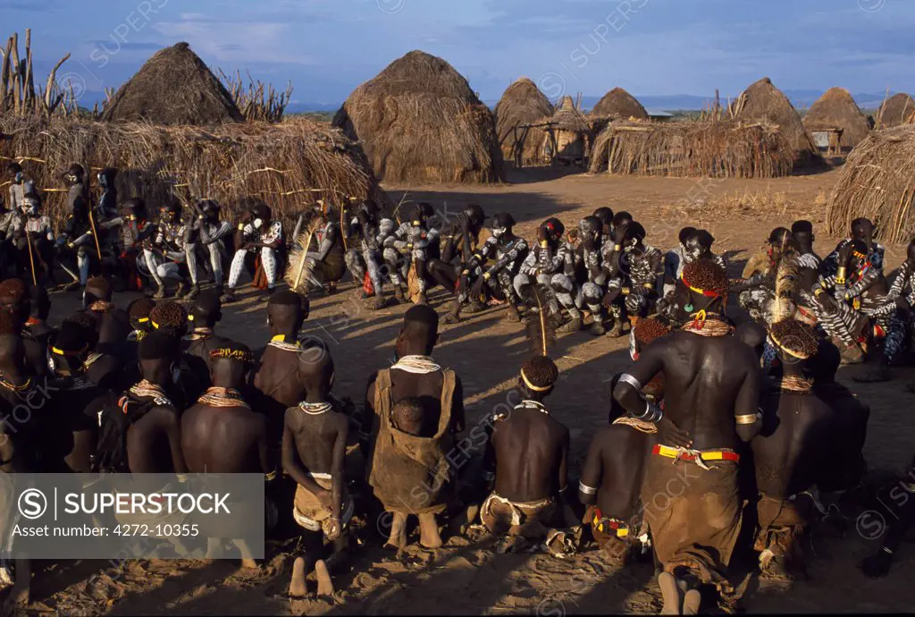 Karo villagers at a dance in the village of Duss.  A small Omotic tribe related to the Hamar, the Karo live along the banks of the Omo River in southwestern Ethiopia.  They are renowned for their elaborate body art using white chalk, crushed rock and other natural pigments.
