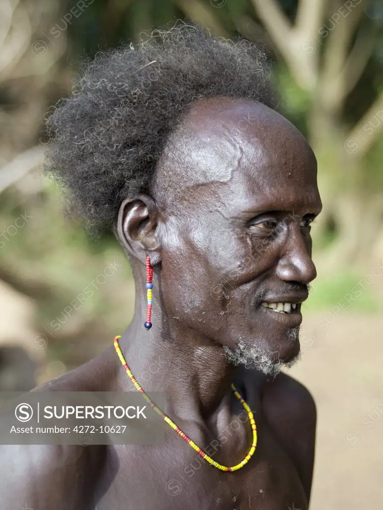 A Dassanech man with a shock of hair.The Omo Delta of southwest Ethiopia is one of the least accessible and least developed parts of East Africa. As such, the culture, social organization, customs and values of the people have changed less than elsewhere.