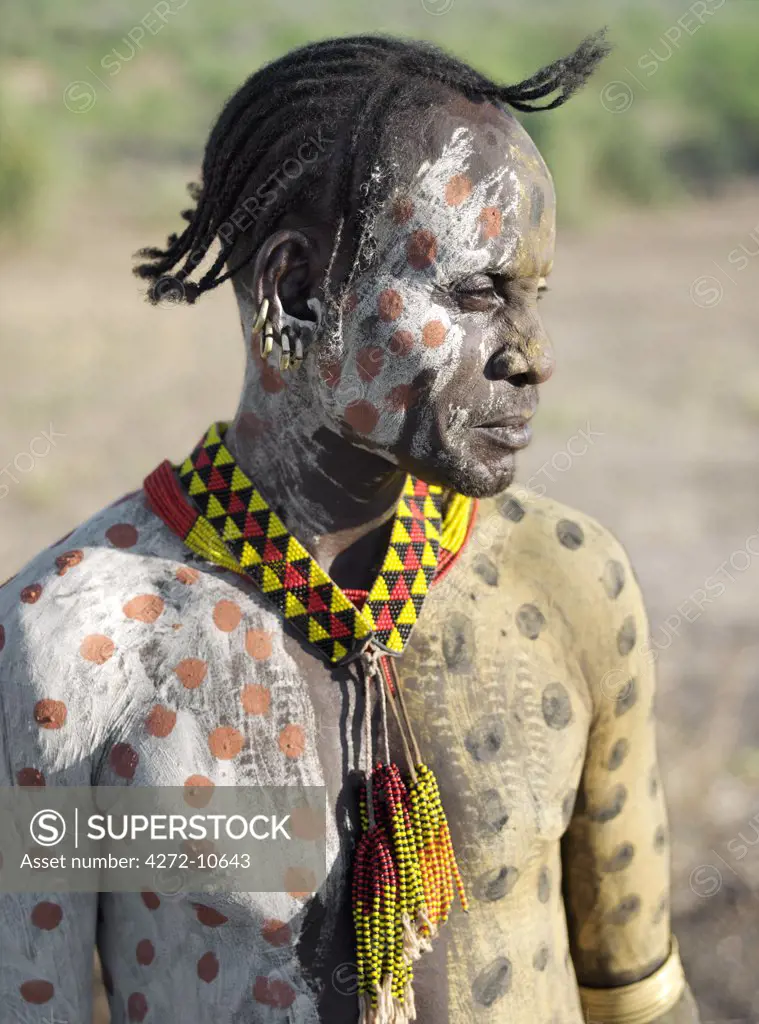 The Karo excel in body art. Before dances and ceremonial occasions, they decorate their faces and torsos elaborately using local white chalk, pulverised rock and other natural pigments. Young men like their hair braided in striking styles.The Karo are a small tribe living in three main villages along the lower reaches of the Omo River in southwest Ethiopia.