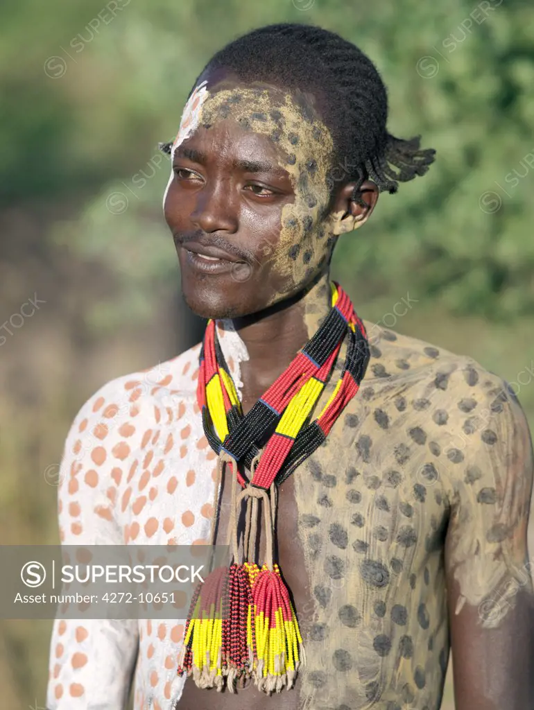 The Karo excel in body art. Before dances and ceremonial occasions, they decorate their faces and torsos elaborately using local white chalk, pulverised rock and other natural pigments. Young men like their hair braided in striking styles.The Karo are a small tribe living in three main villages along the lower reaches of the Omo River in southwest Ethiopia.