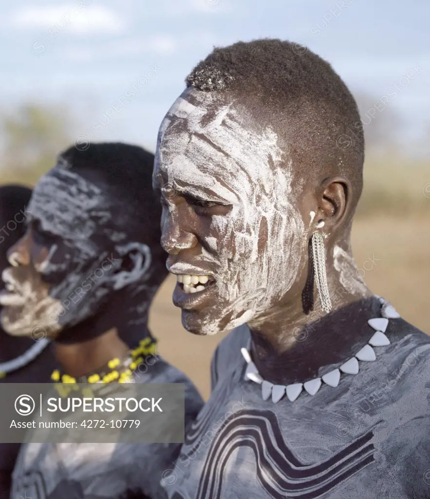 In the late afternoon, Nyagatom men enjoy singing and dancing.  The Nyagatom are one of the largest tribes and arguably the most warlike people living along the Omo River in Southwest Ethiopia.