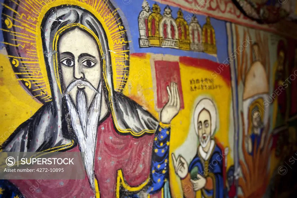 Ethiopia, Lake Tana. Brightly-coloured murals depict religious scenes in Beta Giorgis Monastery.
