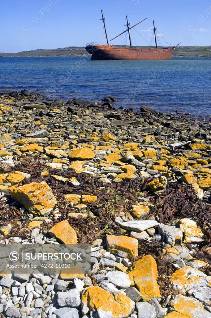 The wreck of the Lady Elizabeth iron ship, built in Sunderland in 1879 damaged in 1913 as she approached Stanley. She was used as a floating warehouse until 1936 when she broke her moorings in a storm and drifted to her current dramatic location at the East end of Stanley harbour. - Whalebone Cove, Port Stanley.