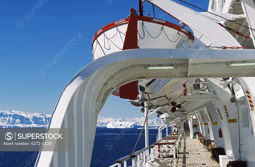Antarctica, Antarctica Peninsula. Promenade deck of the MV Discovery and cruising along Graham Land and the Antarctic Peninsula. Antarctica