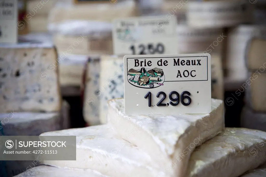 Close up of cheese in a deli case in Aurillac, France