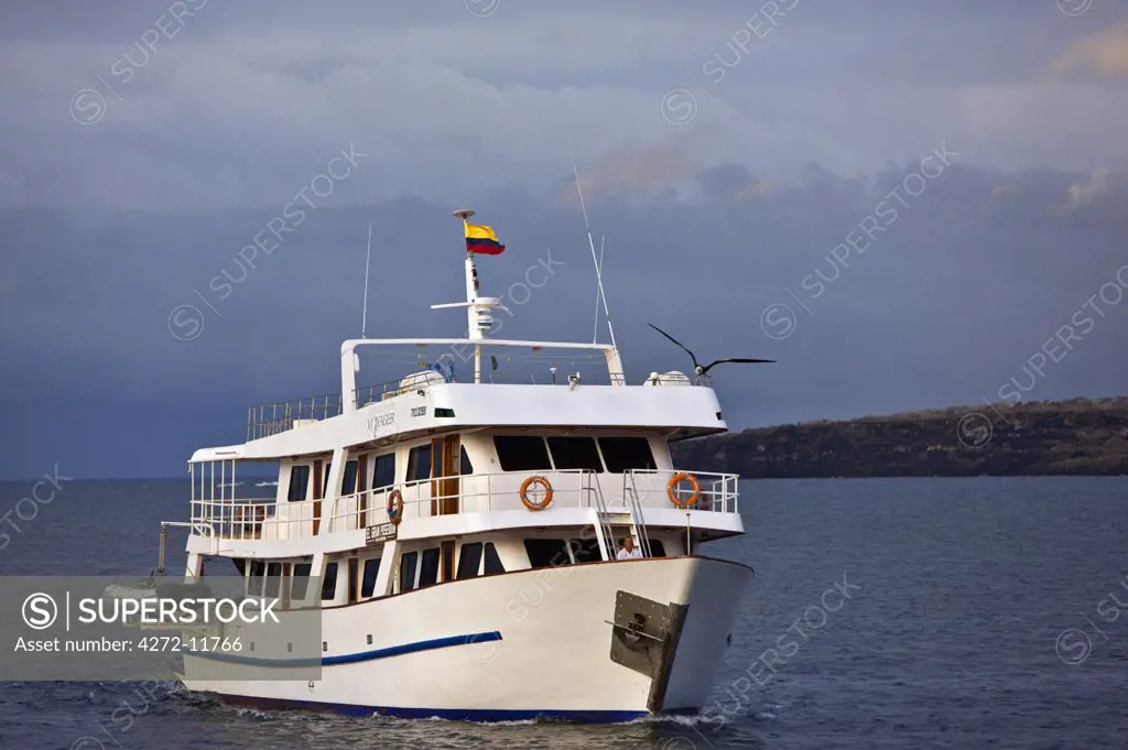 Galapagos Islands, The motor yacht Galapagos Voyager arrives off Genovese.