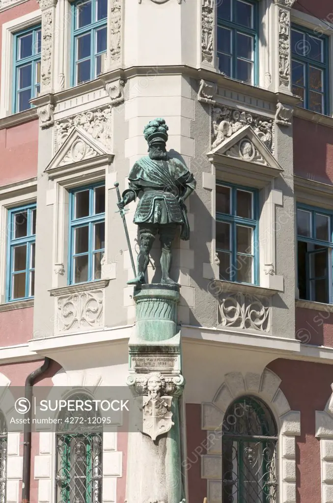 Statue on a facade of the Townhall of Mindelheim, Allgaeu, Bavaria, Germany