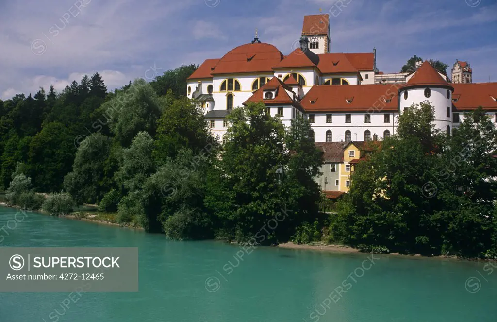 Germany, Bavaria, Fussen. Standing beside the River Lech, the Benedictine St Mang's Abbey (aka Fussen Abbey) was built at this strategic point in the Alps in the 17th- and 18th-centuries.