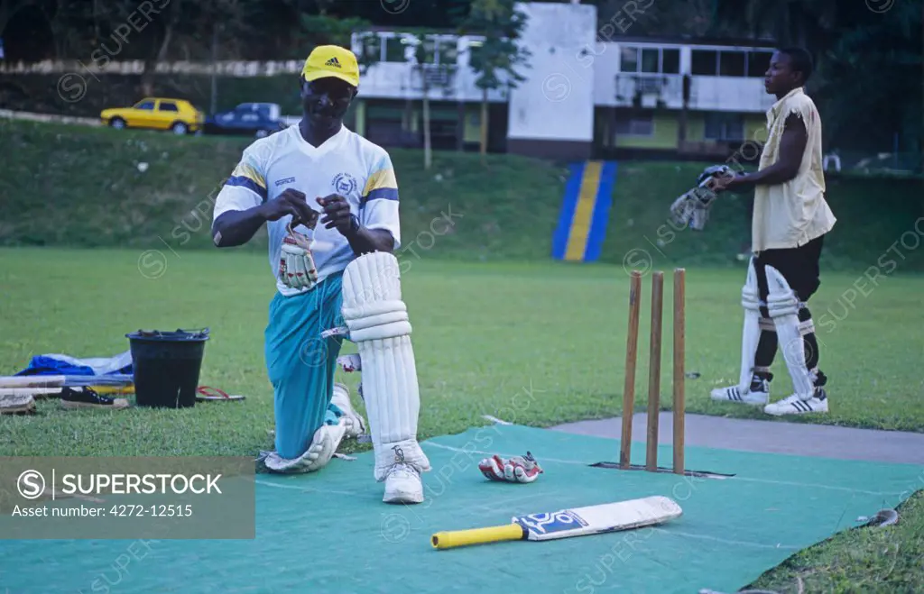 Ghana, Ashanti region, Obuasi. Players prepare at the Anglo Gold Ashanti Cricket Ground.