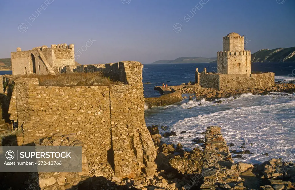 Greece, Peloponnese, Messinia, Methoni. A 16th-century Turkish-built tower, formerly a prison, dominates the tiny island called Bourtzi which is linked by a slender causeway to Methoni's ancient Venetian fortress.