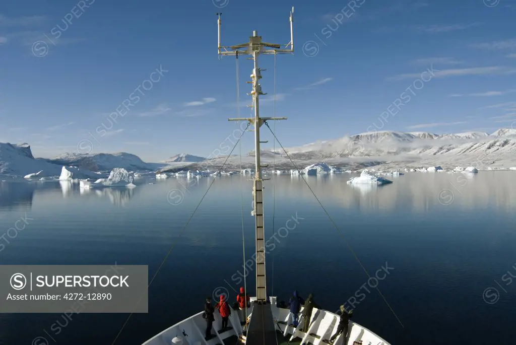 Greenland, Ittoqqortoormiit. Bow of the Russian icebreaker and cruise ship Professor Multanovsky entering the calm fjord of Ittoqqortoormiit (Scoresbysund) on the north east coast of Greenland.