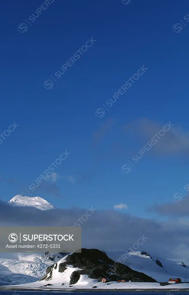 Antarctica, Antarctic Peninsula, Half Moon Island. Argentinean base at Half Moon Island with the Livingston Mountains in the background