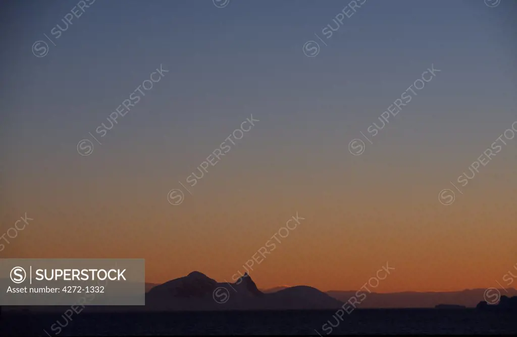 Antarctica, Antarctic Peninsula. Sunset over Antarctic Peninsula.
