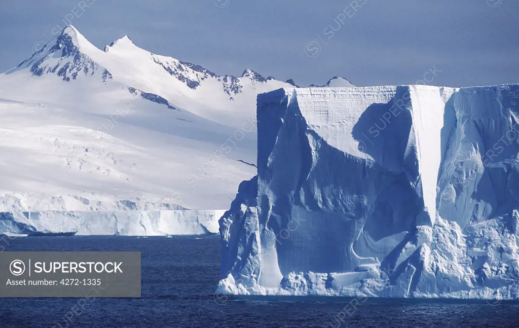 Antarctica, Antarctic Peninsula, Graham Land. Tabular icebergs and Graham Land. Antarctic Peninsula.