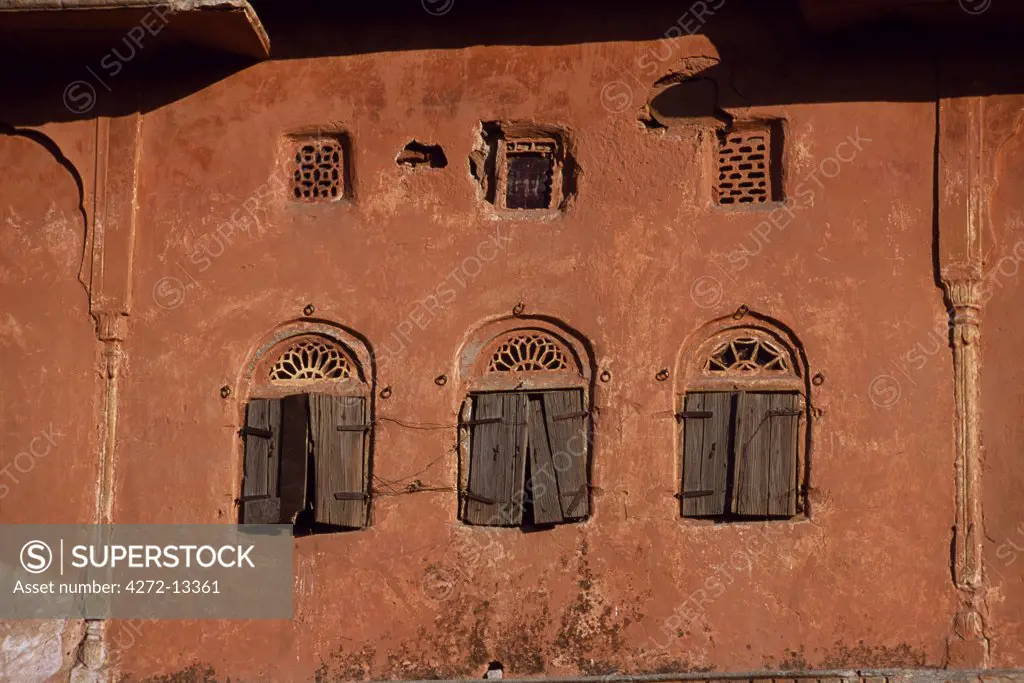 Detail of shutters on old haveli (merchant's house) in the Pink City (Old city)