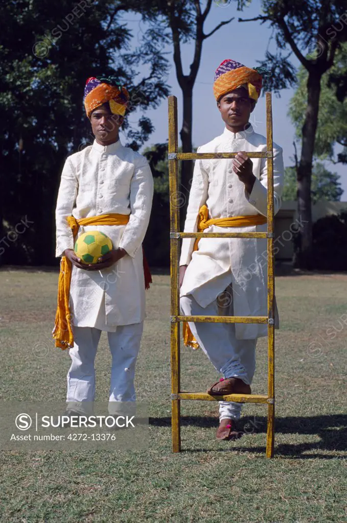 Attendants with ladder to help players mount & dismount at elephant polo match, Jai Mahal Palace Hotel