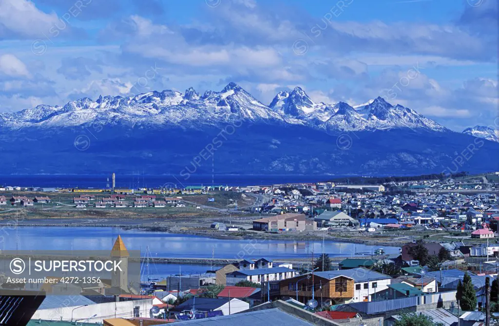 Argentina, Tierra del Fuego, Ushuaia. Town & harbour with hills of Isla Navarino behind.