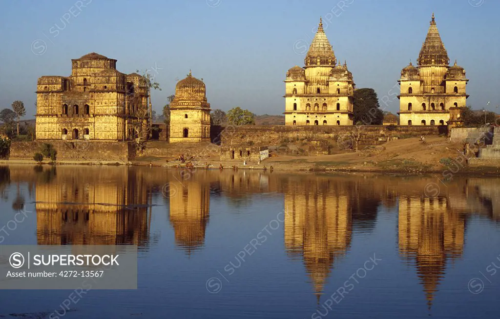 The 14th-century chhatris, or cenotaphs, of former Bundela rulers stand reflected in the placid waters of the River Betwa.