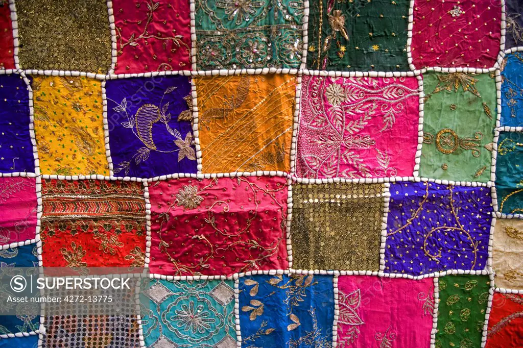 Elaborate rugs for sale in Jaiselmeer market, Rajasthan, India.