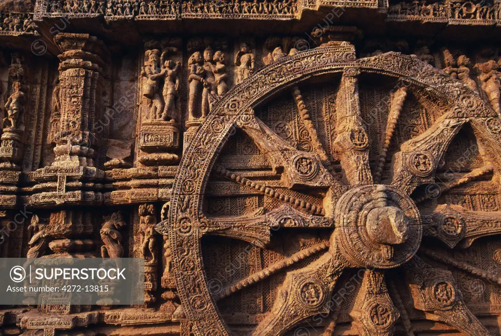 Detail of sandstone carvings at the Konark Sun Temple in Puri. Konark Sun Temple is located in the state of Orissa near the sacred city of Puri. The sun Temple of Konark is dedicated to the sun God or Surya. It is a masterpiece of Orissas medieval architecture. Sun temple has been declared a world heritage site by UNESCO.
