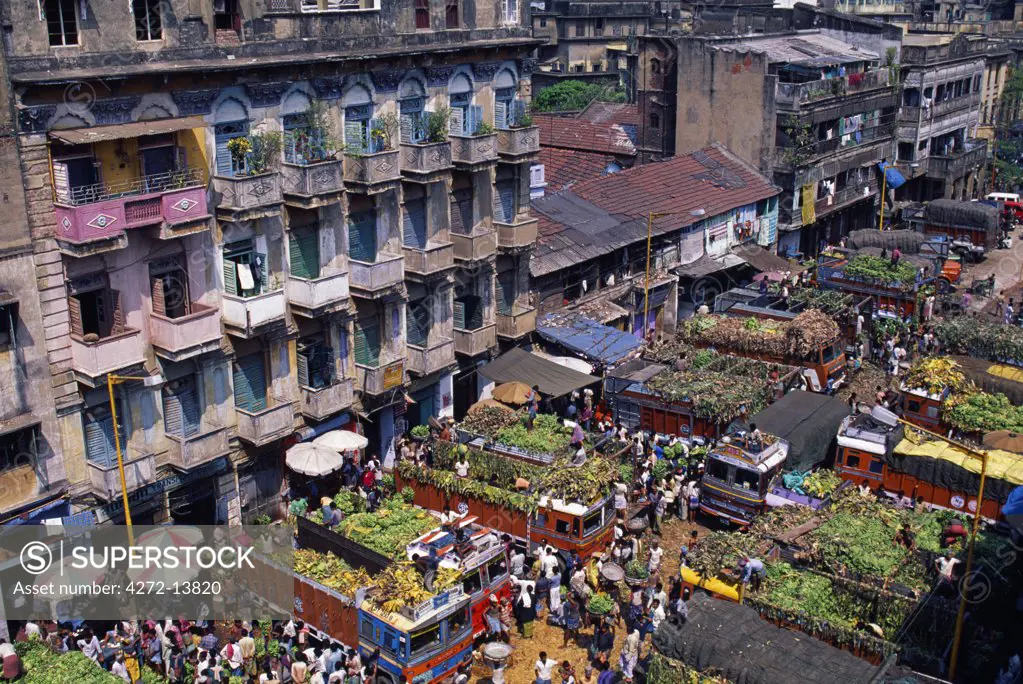 Residential buildings overlook the Mechua Fruit market, Central Kolkata.
