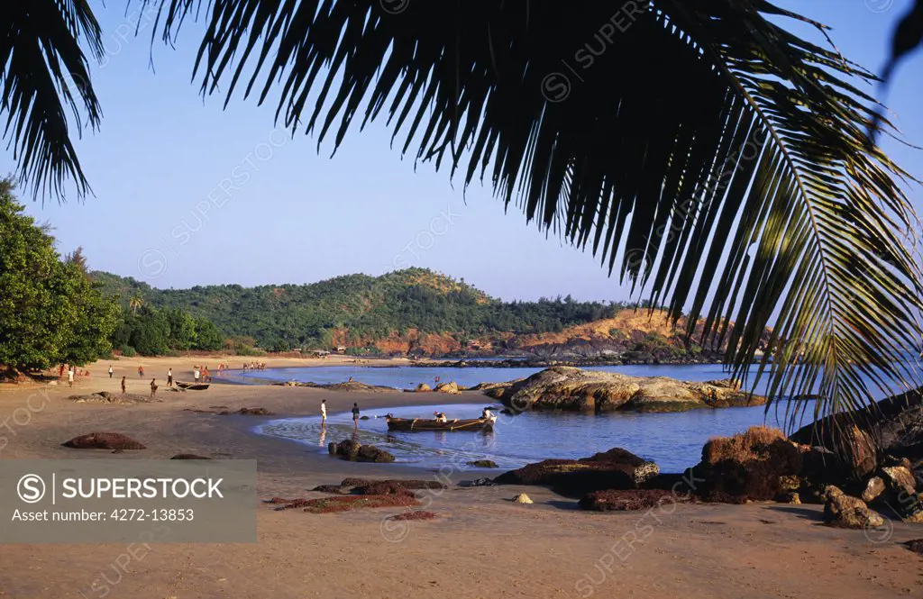 India, Karwa District, Gokarna. Om Beach, one of several beaches outside the pilgrimage town of Gokarna. Gokarna is situated on the west coast on India, south of Goa. Go karna literally means cows ear in Hindi and Sanskrit. This name is believed to derive from mythological legend, in which Lord Shiva emerges from an ear of a cow.