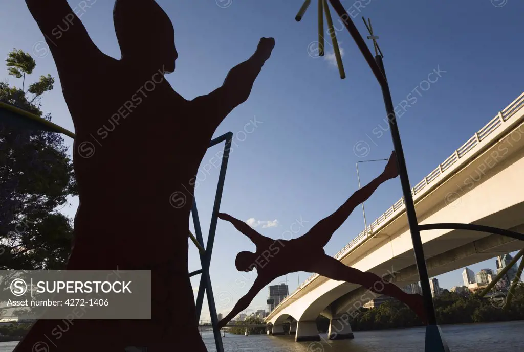 Australia, Queensland, Brisbane. Sculptures dominate the Brisbane foreshore beneath the Riverside Expressway.