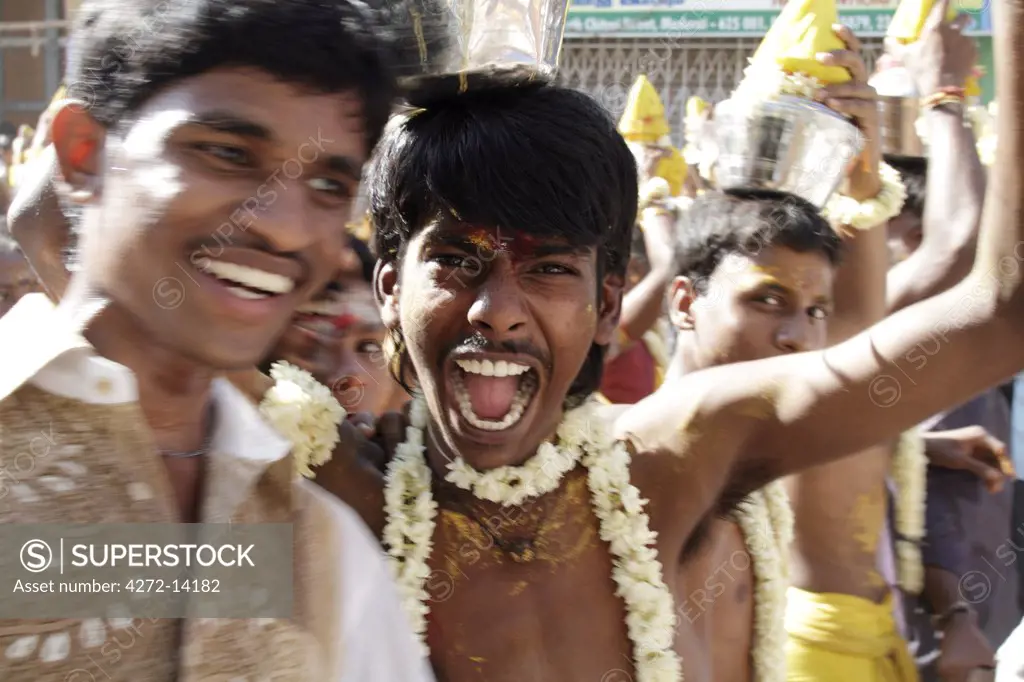 India, Madurai. Devotees of a Kavadi procession.
