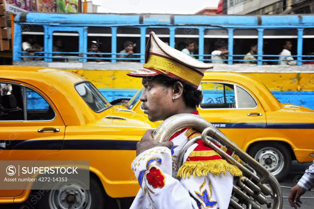 Member of a music band. Streets of Kolkata. India