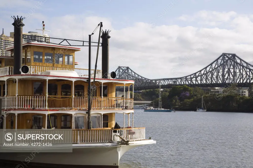 Australia, Queensland, Brisbane. One of a number of old paddle wheelers on the Brisbane River used for dinner and nightlife cruises.