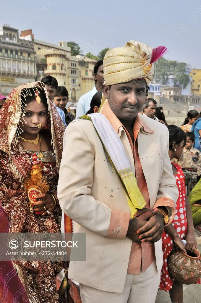 The grooms in a marriage on the banks of the Ganges river. Varanasi, India