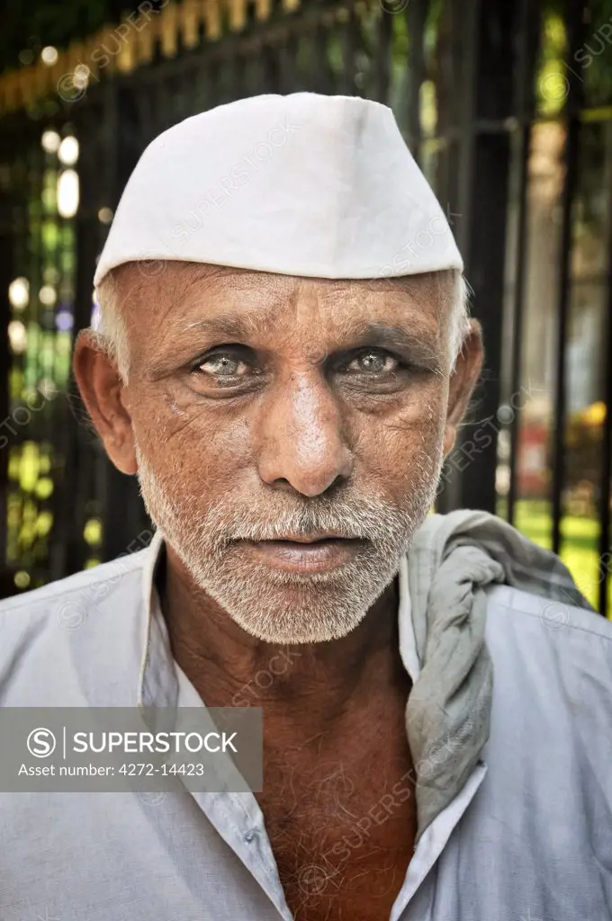 Dabbawala of Mumbai (Bombay). They collect freshly cooked food from the house of the office workers and deliver it to their respective workplaces and return back the boxes by using several means of transport. India