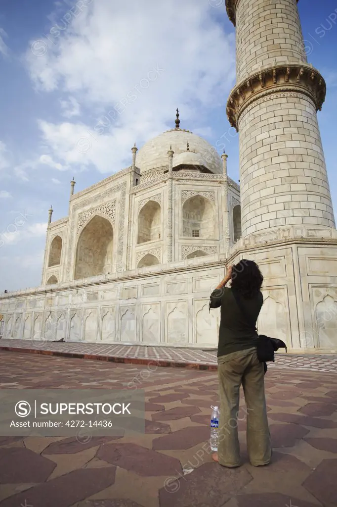 Tourist taking photo of Taj Mahal, Agra, Uttar Pradesh, India