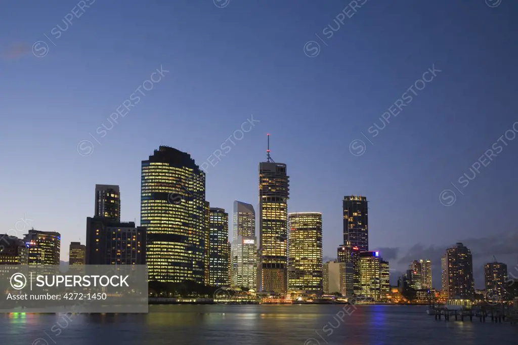 Australia, Queensland, Brisbane. The lights of Brisbane's business district are reflected in the waters of the Brisbane River.