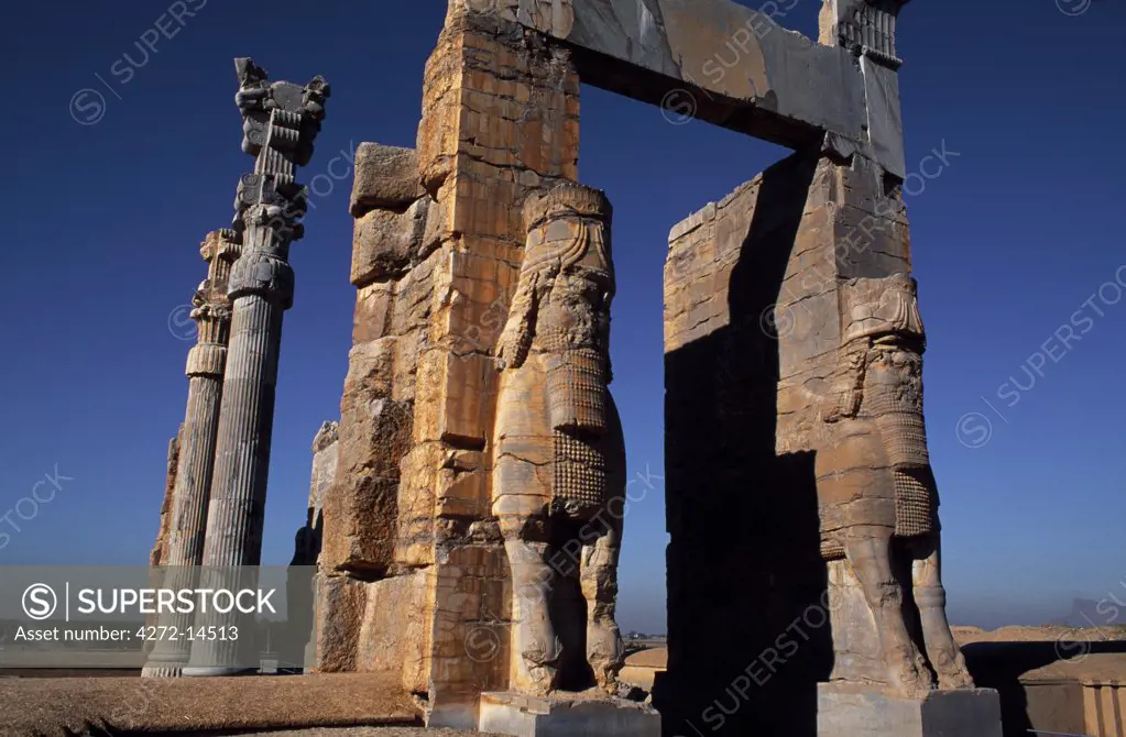 Iran, Persepolis. General view, Gate of Xerxes, Persepolis, near Shiraz.  Once covered an area of over 600 square metres.  The remaining doors are still covered with inscriptions and carvings in ancient Elamite, as well as many other languages.
