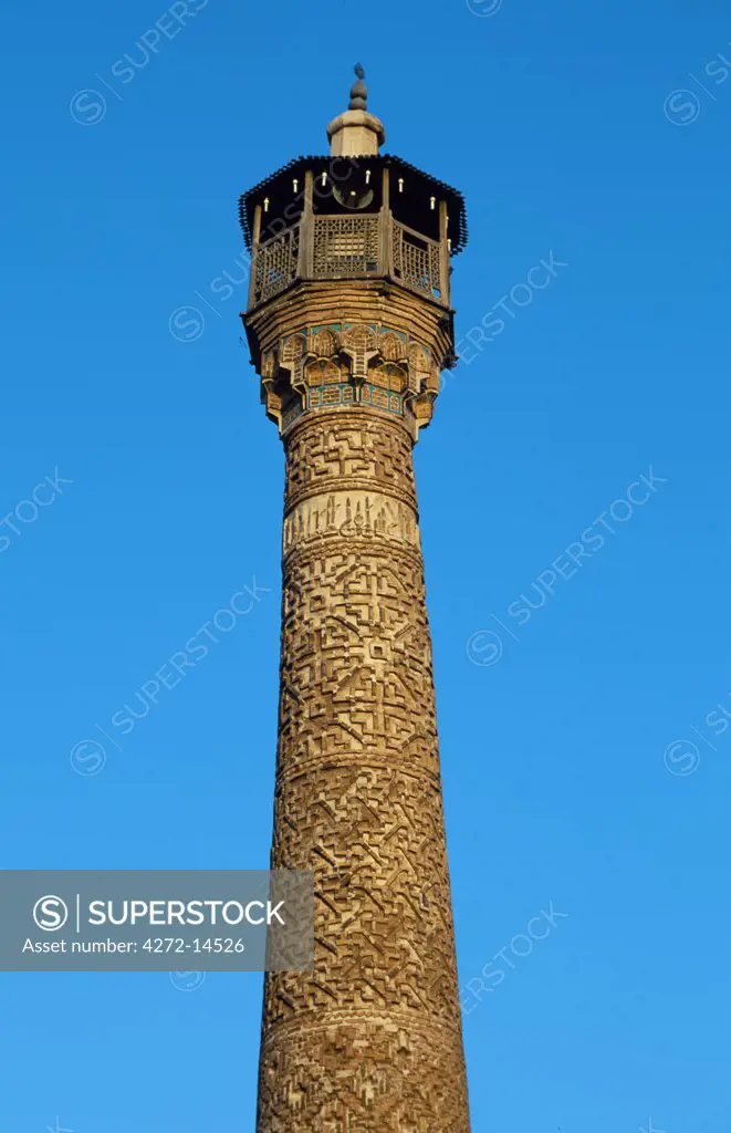 Masjed e Jame minaret and bazaar, Semnan, Semnan Province, Iran.  Seljuk period, first half of 11th century.  The Masjed e Jame, Friday mosque, is in the heart of the bazaar. Further evidence of the way in which, for people of the Silk Road, faith and commerce were frequently intertwined.