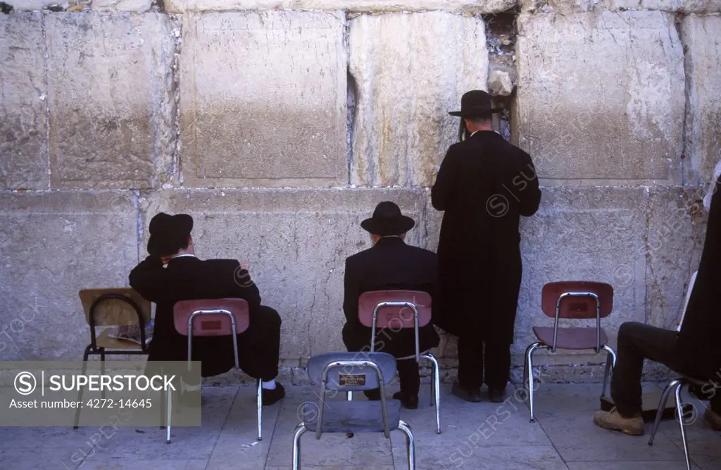 Jews praying at the Wailing Wall.